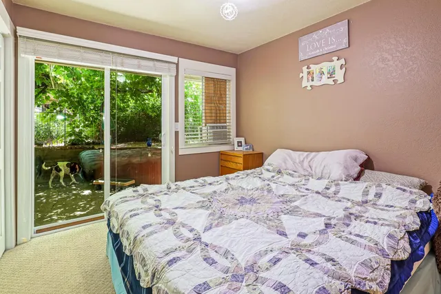 a view of a chairs and table on the deck
