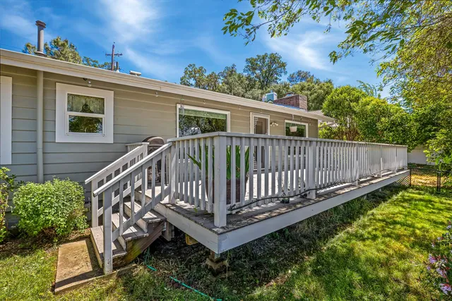 an aerial view of a house with a garden