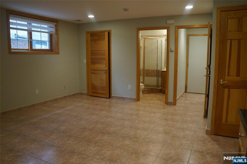 520 7th Street, Unit B Palisades Park, NJ 07650 - Photo 20 of 22 an empty room with windows