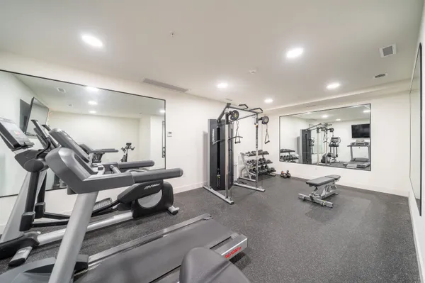 a view of a room with gym equipment
