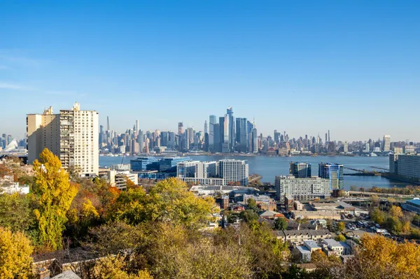 a view of a city with tall buildings