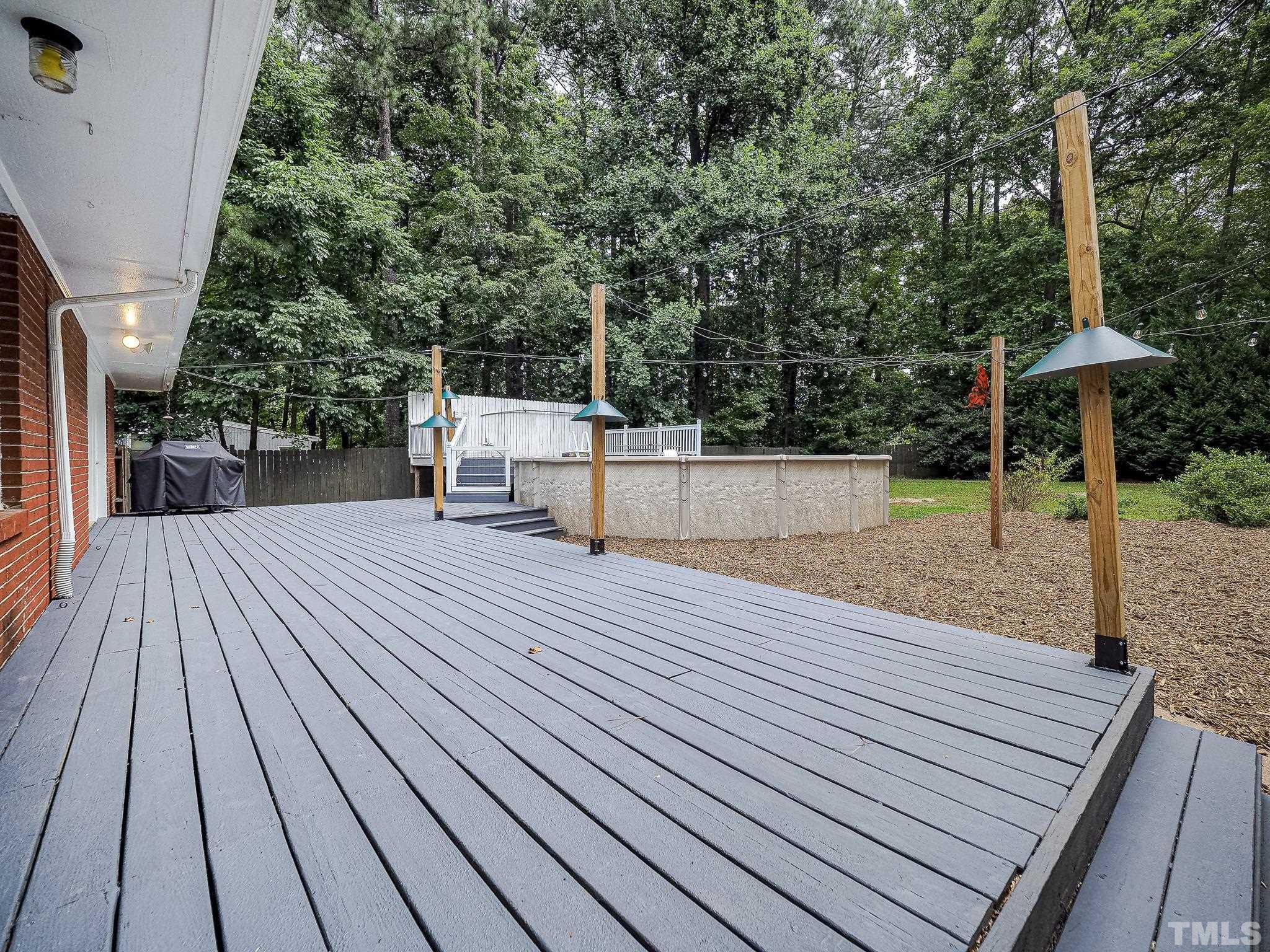 1314 Trinity Circle Raleigh, NC 27607 - Photo 27 of 33 a view of backyard with sitting area