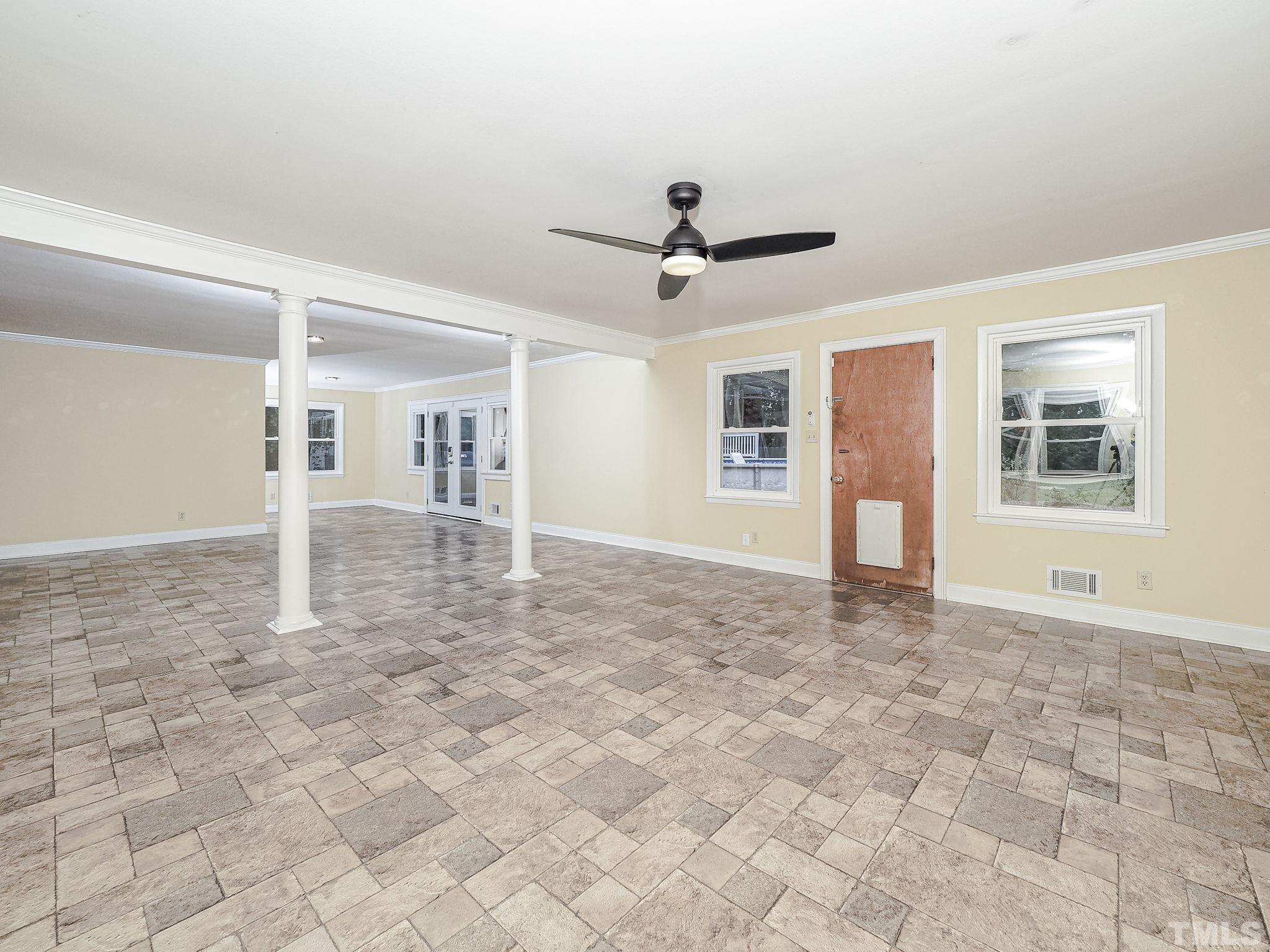 1314 Trinity Circle Raleigh, NC 27607 - Photo 28 of 33 a view of livingroom with hardwood floor and a ceiling fan