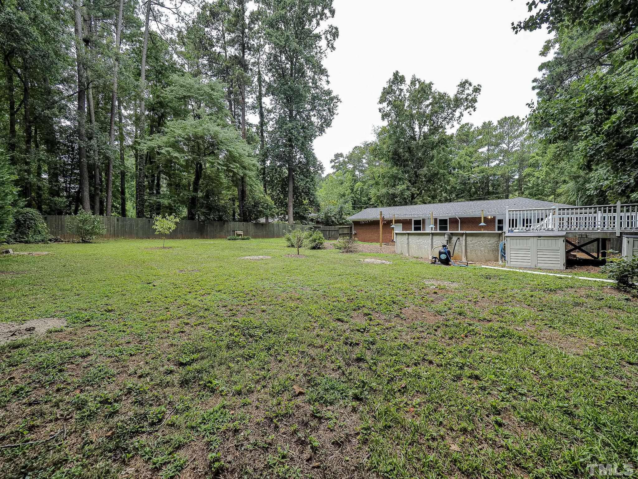 1314 Trinity Circle Raleigh, NC 27607 - Photo 30 of 33 a view of a house with a yard
