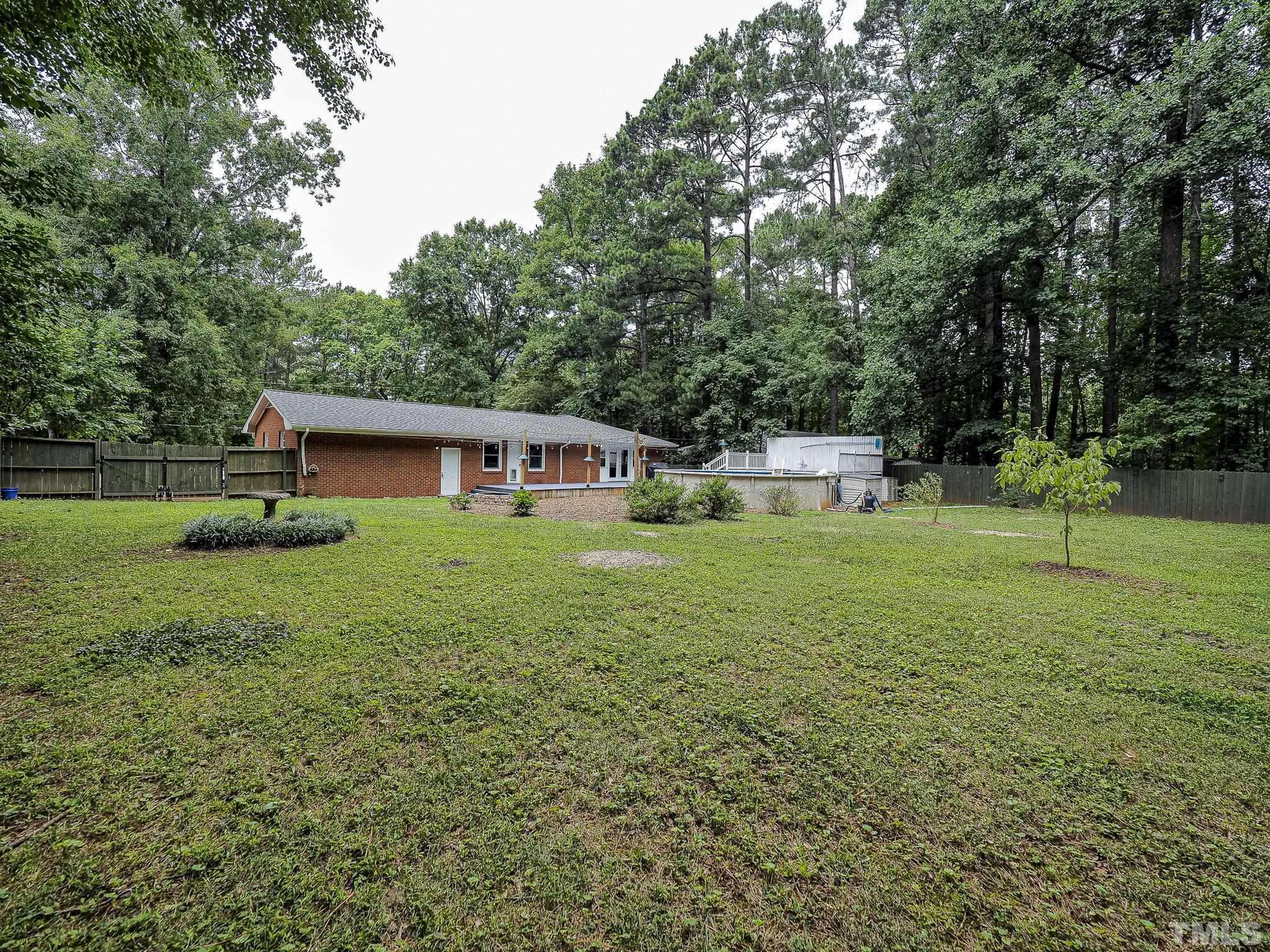 1314 Trinity Circle Raleigh, NC 27607 - Photo 31 of 33 a front view of house with yard and green space