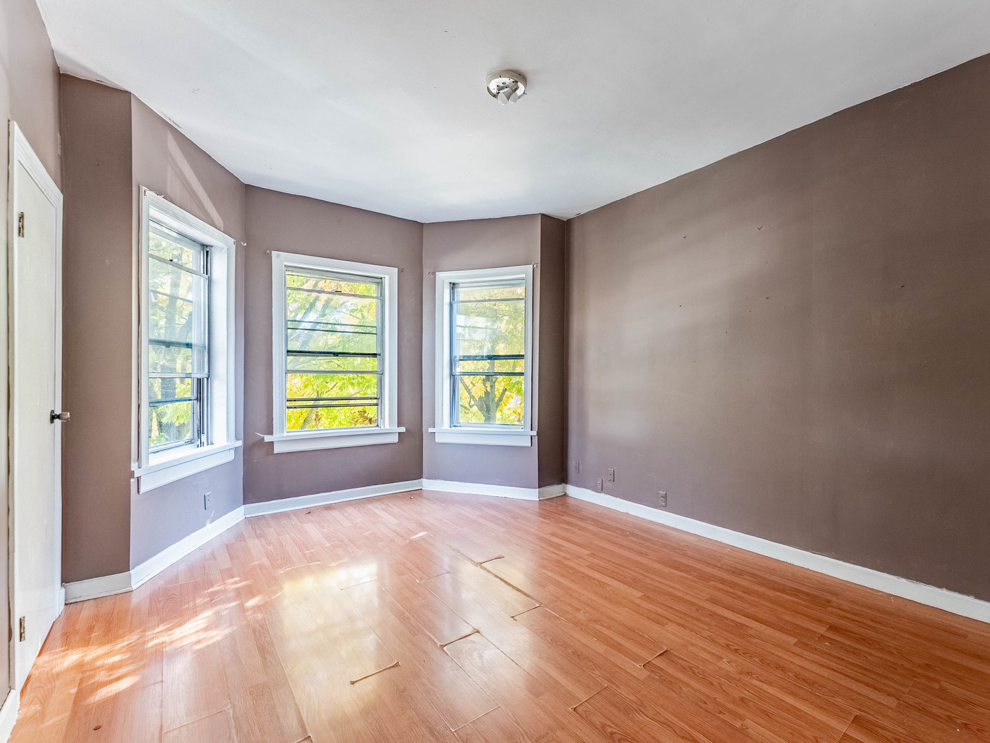3244 North Drake Avenue Chicago, IL 60618 - Photo 3 of 37 a view of an empty room with window