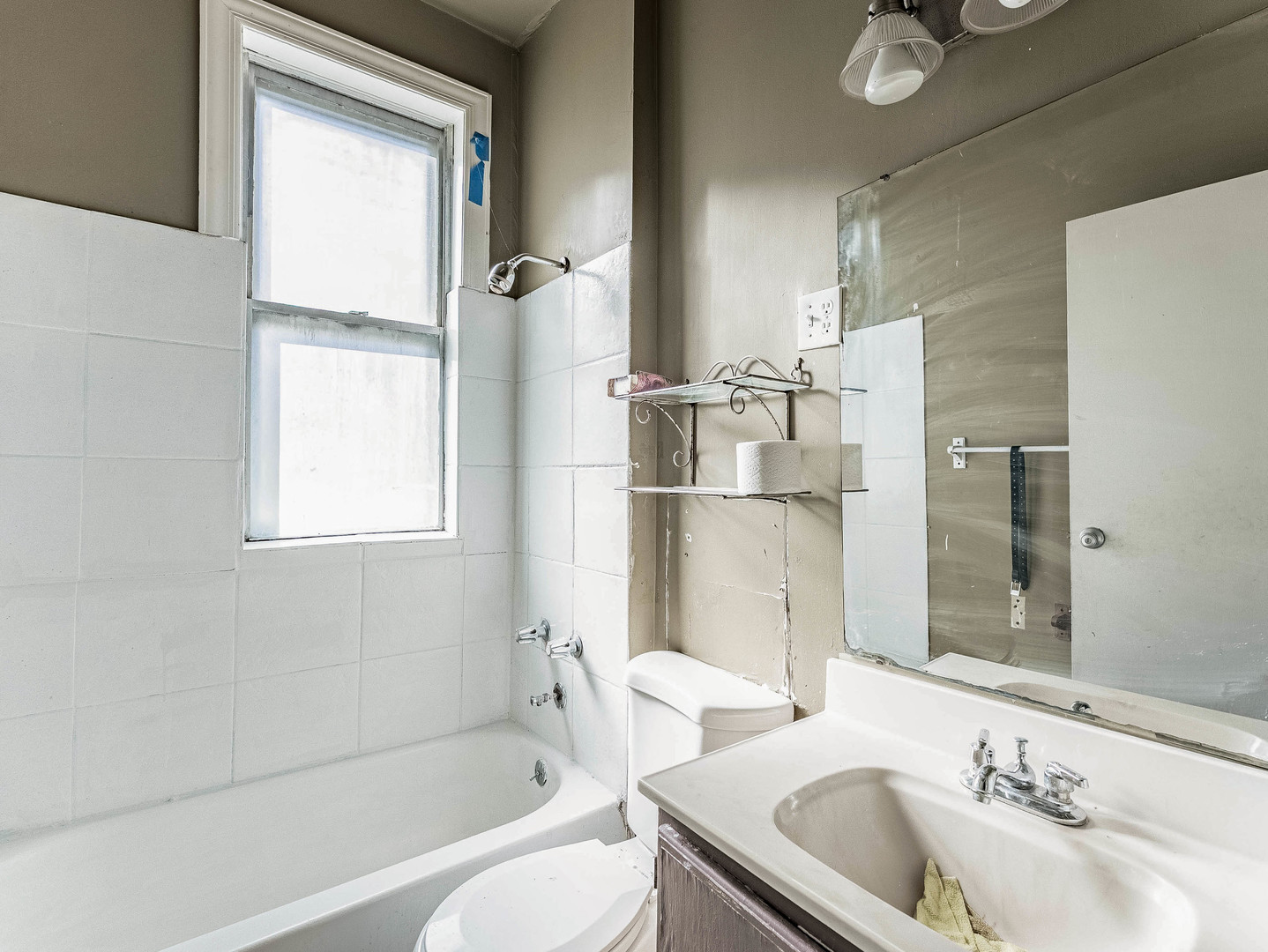 3244 North Drake Avenue Chicago, IL 60618 - Photo 6 of 37 a bathroom with a granite countertop sink toilet and shower