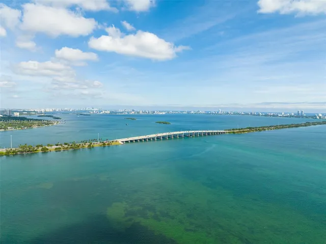 a view of a city with an ocean