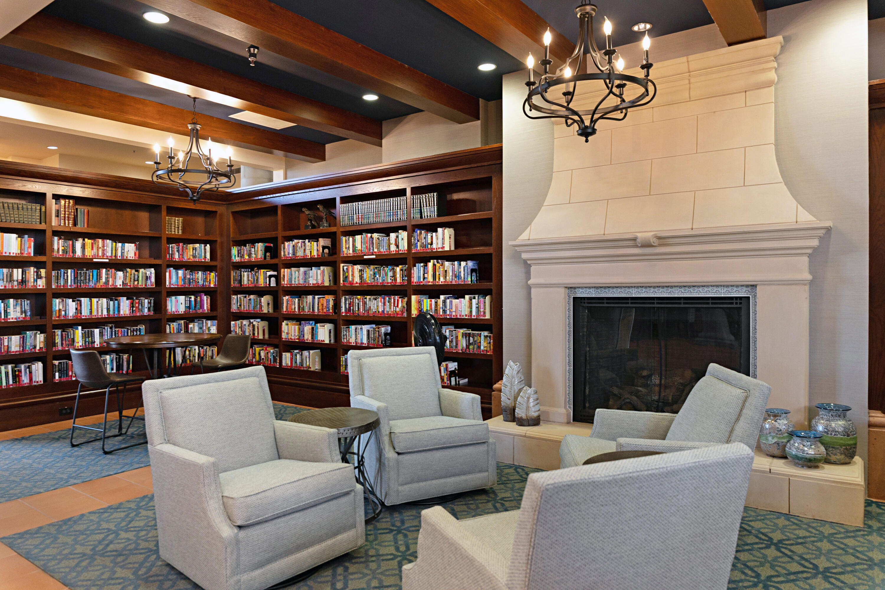 81935 Avenida Bienvenida Indio, CA 92203 - Photo 26 of 35 a living room with furniture and a fireplace