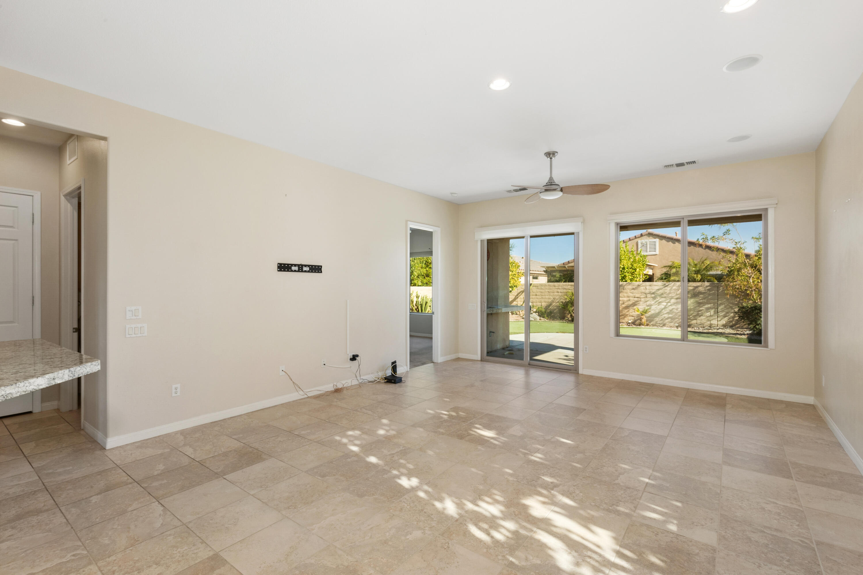 81935 Avenida Bienvenida Indio, CA 92203 - Photo 4 of 35 a view of an empty room with a window