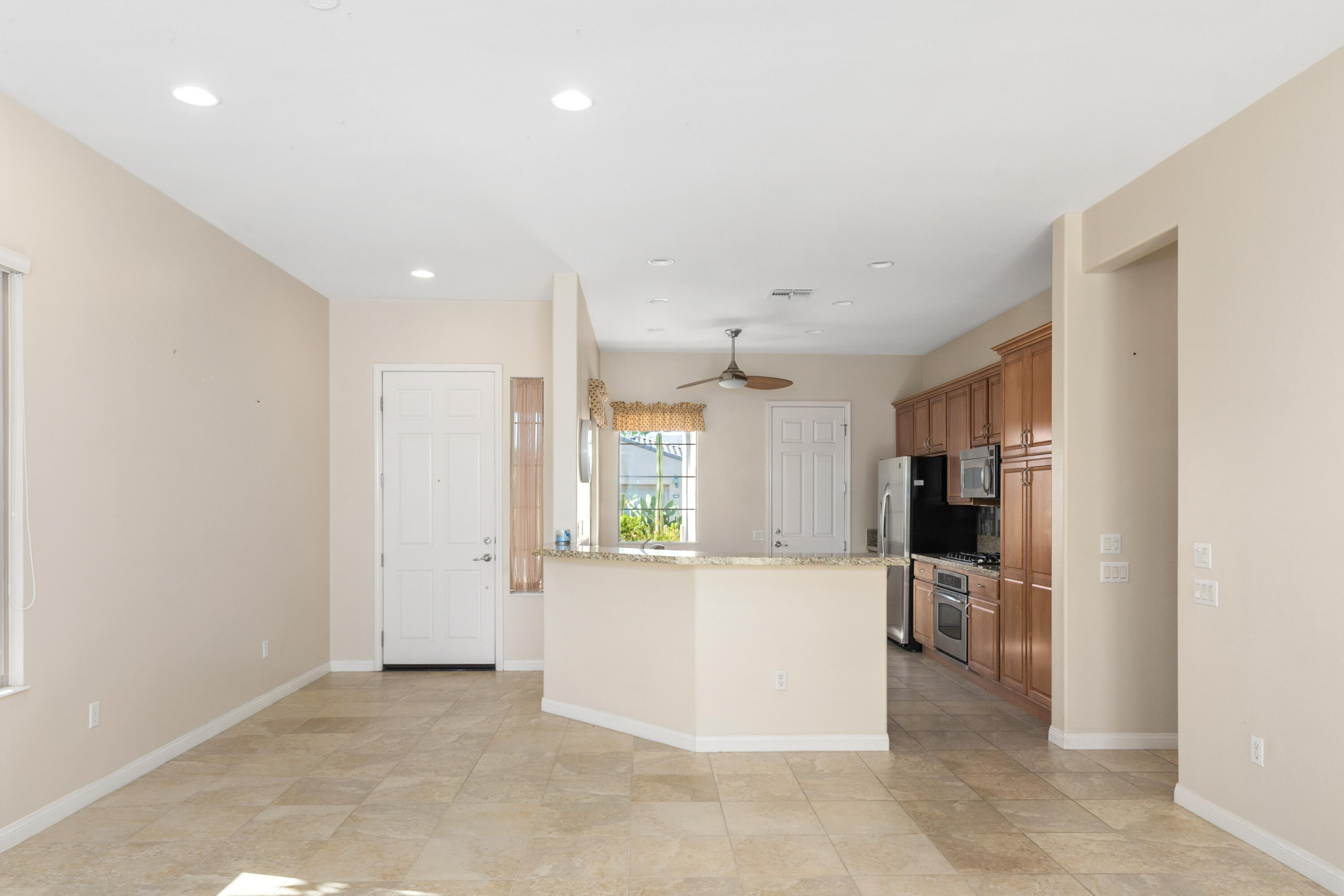 81935 Avenida Bienvenida Indio, CA 92203 - Photo 5 of 35 a view of a kitchen and window