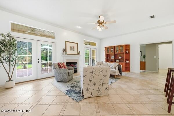 11381 Mandarin Ridge Lane Jacksonville, FL 32258 - Photo 16 of 43 a living room with furniture potted plant and a fireplace