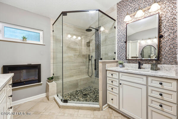 11381 Mandarin Ridge Lane Jacksonville, FL 32258 - Photo 26 of 43 a bathroom with a shower sink and mirror