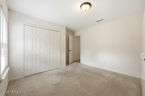 11381 Mandarin Ridge Lane Jacksonville, FL 32258 - Photo 30 of 43 an empty room with windows