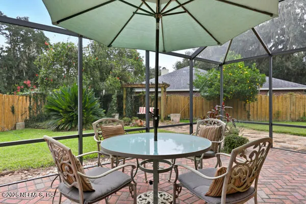 a view of an outdoor sitting area with furniture