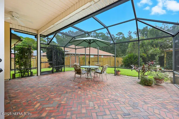 a view of a two chairs in a patio