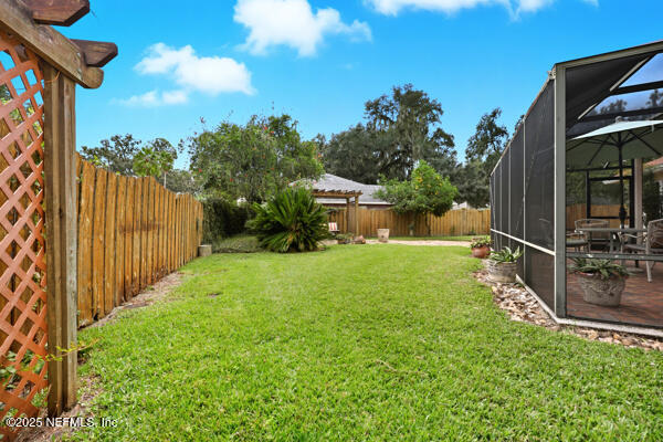 11381 Mandarin Ridge Lane Jacksonville, FL 32258 - Photo 39 of 43 a view of a backyard with pathway