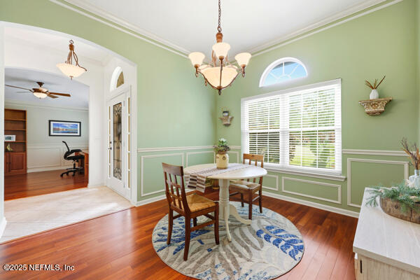 11381 Mandarin Ridge Lane Jacksonville, FL 32258 - Photo 7 of 43 a view of a dining room with furniture window and wooden floor