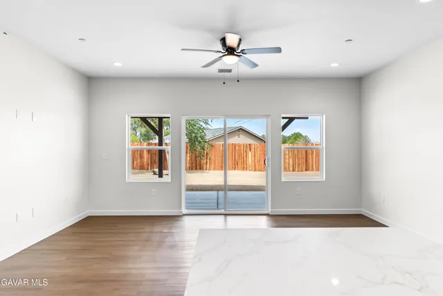 a bathroom with a sink a toilet and bathtub