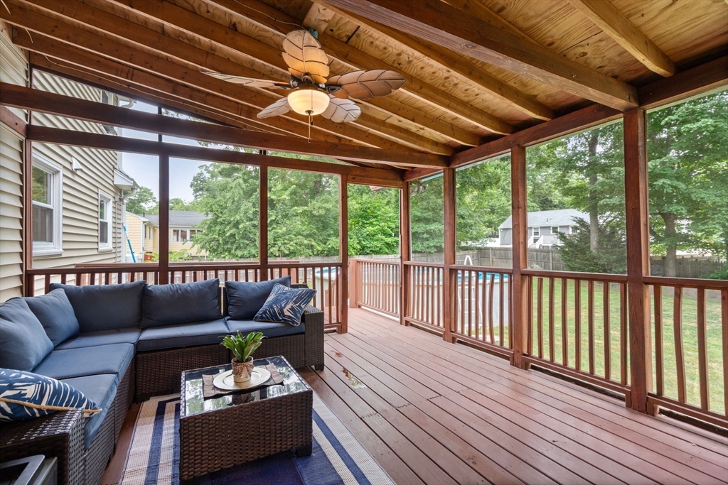 9 Laurel Lane Bellingham, MA 02019 - Photo 6 of 30 a roof deck with couches and wooden floor