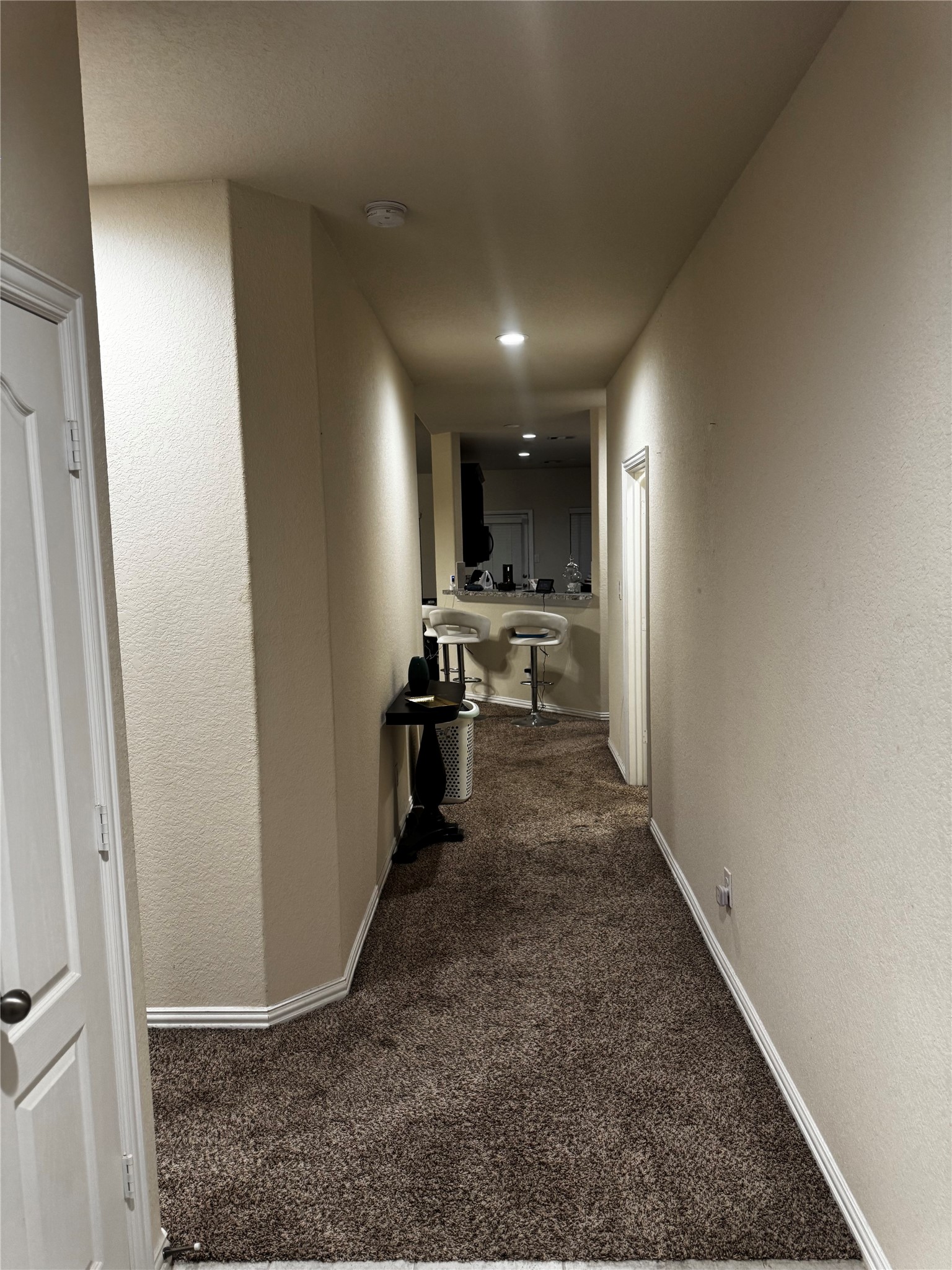 22739 Highland Maple Court Spring, TX 77373 - Photo 11 of 48 a view of a hallway with kitchen