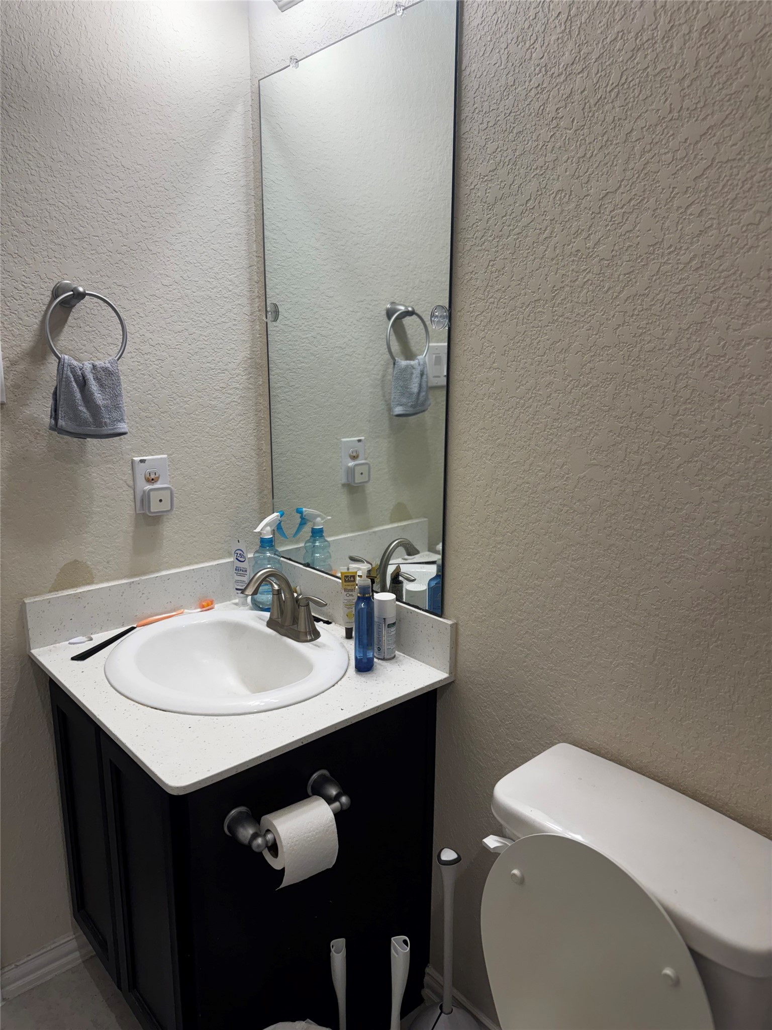 22739 Highland Maple Court Spring, TX 77373 - Photo 14 of 48 a bathroom with a sink vanity and toilet