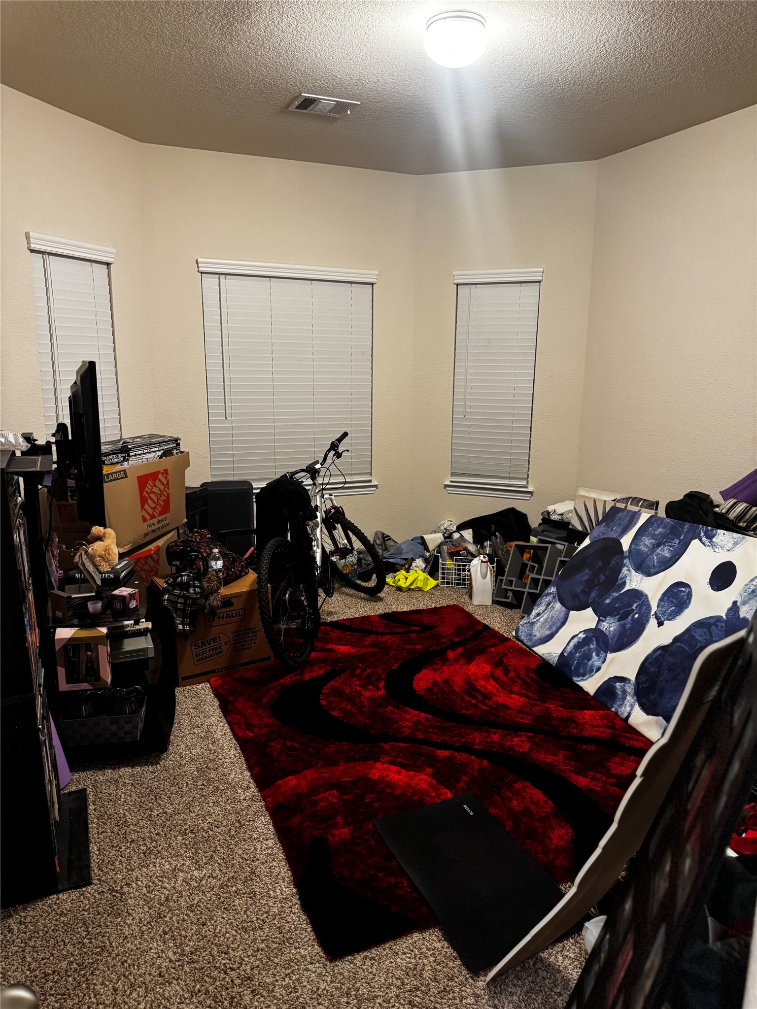 22739 Highland Maple Court Spring, TX 77373 - Photo 18 of 48 a bed room with bed and a couch