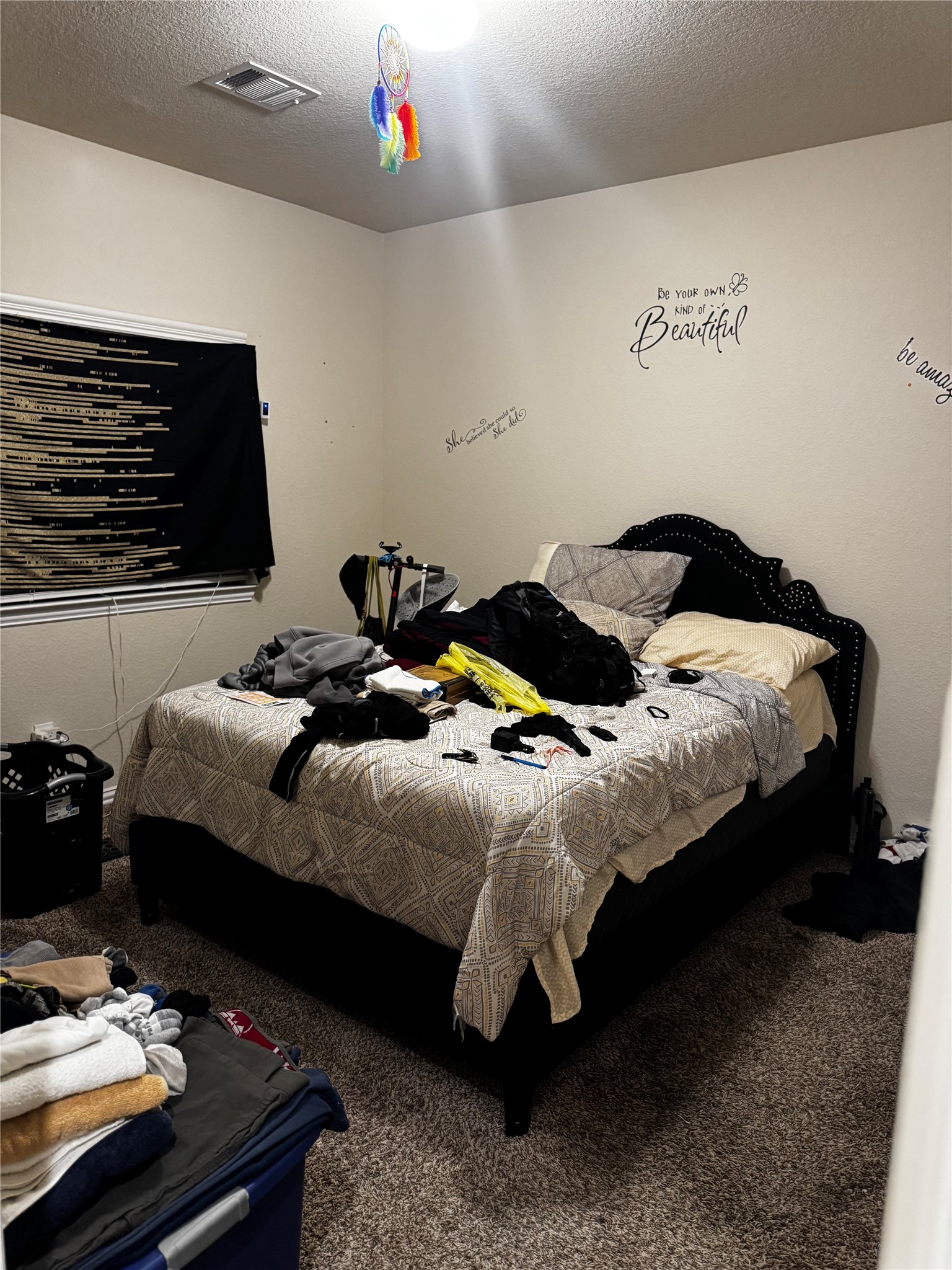 22739 Highland Maple Court Spring, TX 77373 - Photo 19 of 48 a bedroom with a bed and a flat screen tv