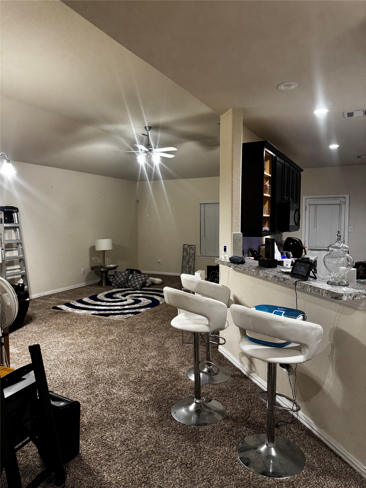 22739 Highland Maple Court Spring, TX 77373 - Photo 22 of 48 a room with lots of chairs and mirrors