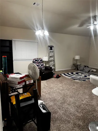 a room with furniture and wooden floor