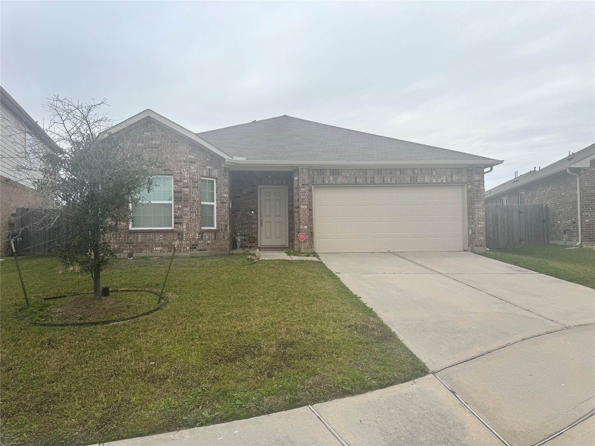 22739 Highland Maple Court Spring, TX 77373 - Photo 5 of 48 a front view of a house with a yard and garage