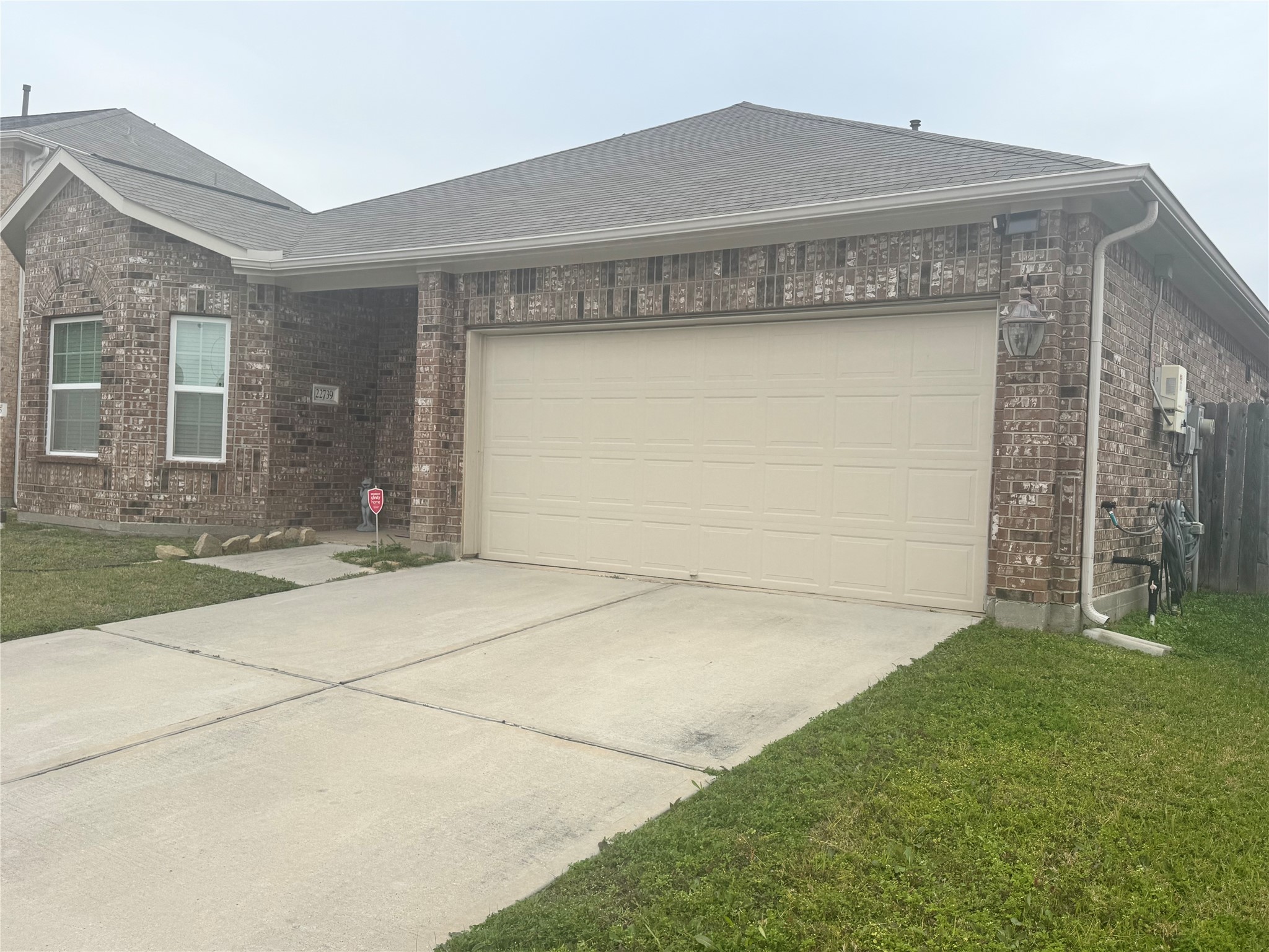 22739 Highland Maple Court Spring, TX 77373 - Photo 9 of 48 a front view of a house with a yard and garage