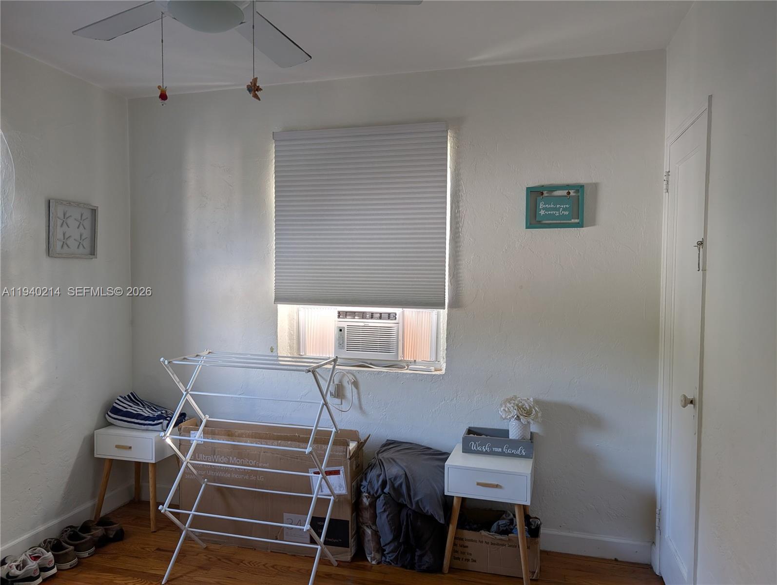 311 Southwest 2nd Avenue, Unit 1 Dania Beach, FL 33004 - Photo 6 of 14 a room with gym equipment