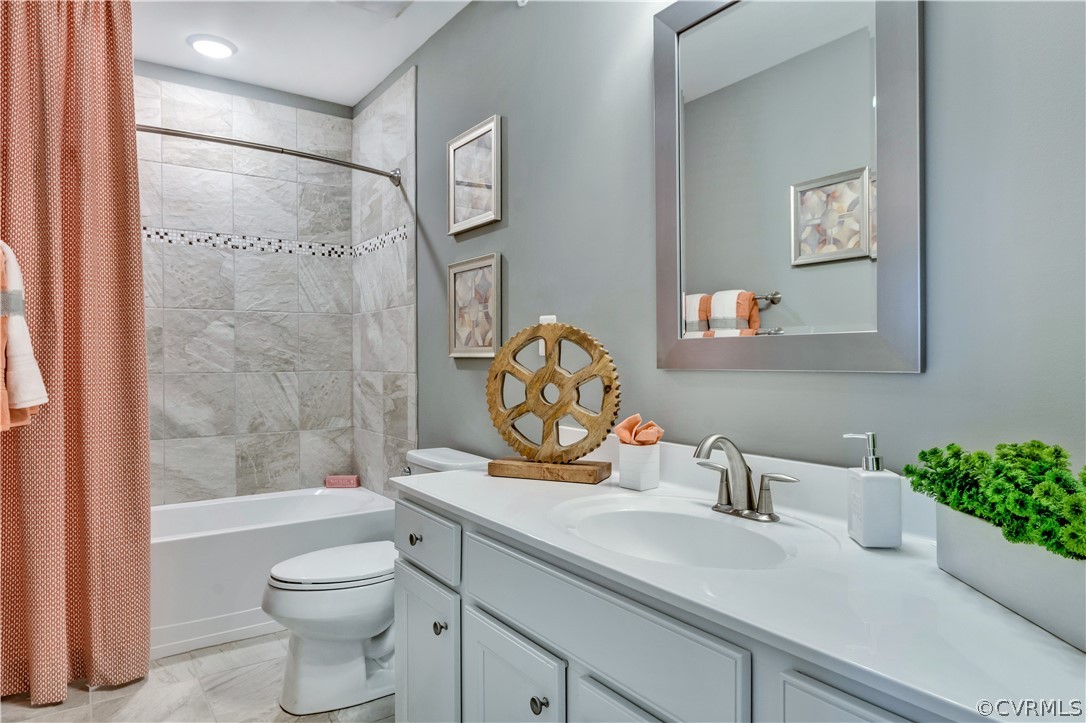 4359 Saunders Station Loop, Unit B Richmond, VA 23233 - Photo 2 of 31 a bathroom with a sink a toilet and shower