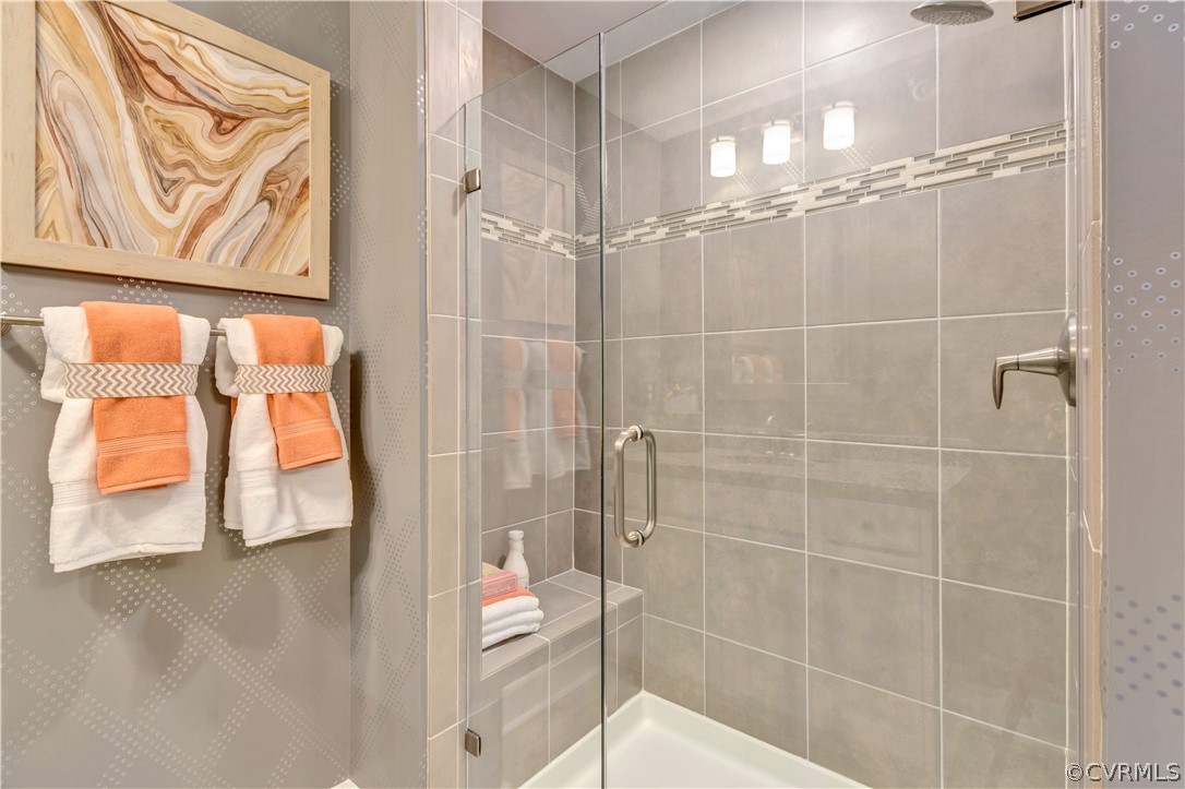 4359 Saunders Station Loop, Unit B Richmond, VA 23233 - Photo 25 of 31 a bathroom with a shower