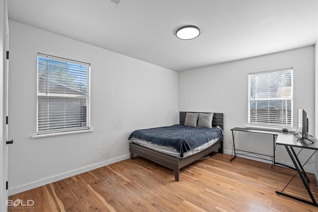 3407 Hickory Ridge Road Shreveport, LA 71108 - Photo 25 of 35 Bedroom with light wood-style floors
