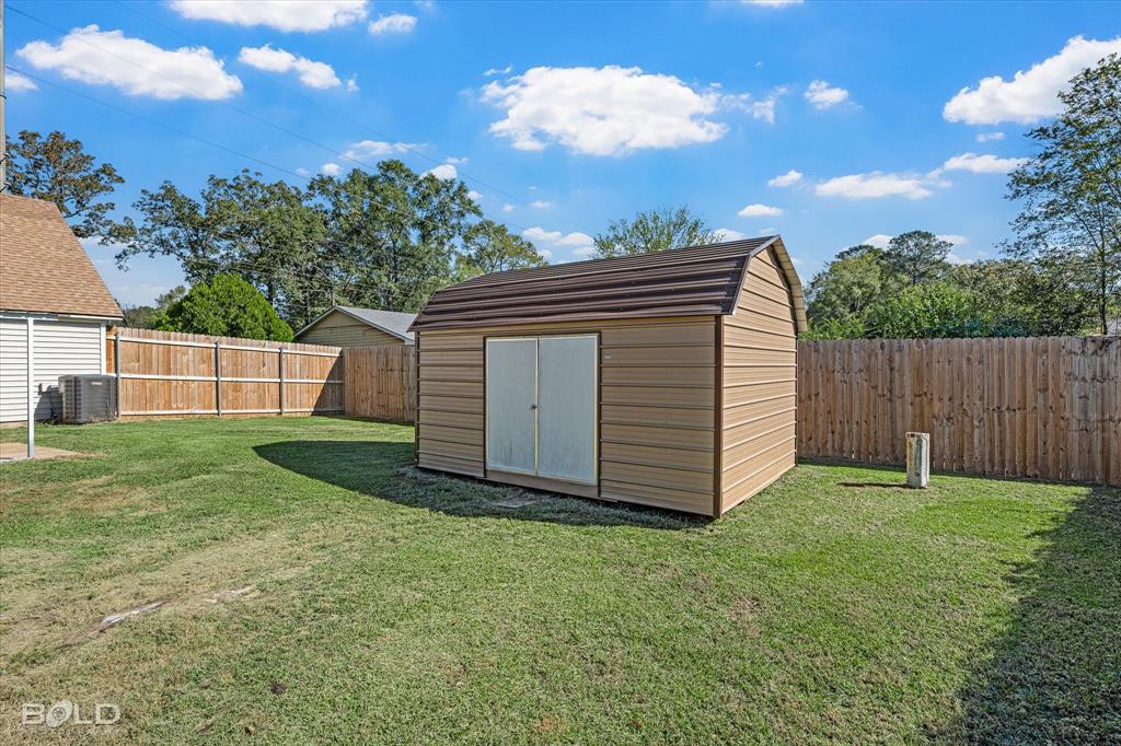 3407 Hickory Ridge Road Shreveport, LA 71108 - Photo 35 of 35 View of shed featuring a fenced backyard
