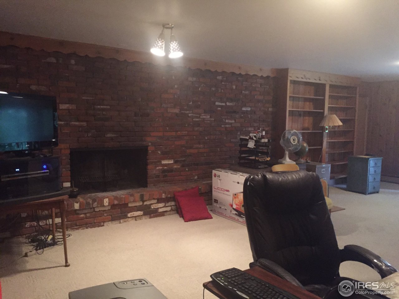 14395 Foothill Road Golden, CO 80401 - Photo 14 of 18 basement fireplace