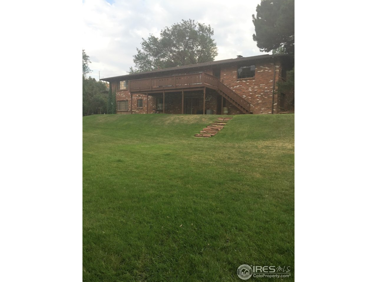 14395 Foothill Road Golden, CO 80401 - Photo 10 of 18 backyard view of home