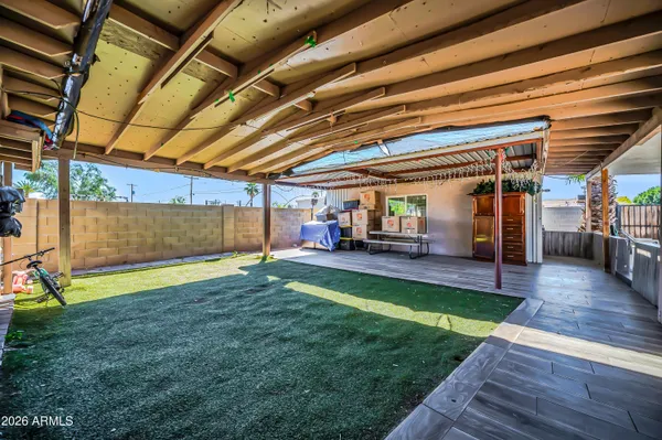 a view of a kitchen with seating area