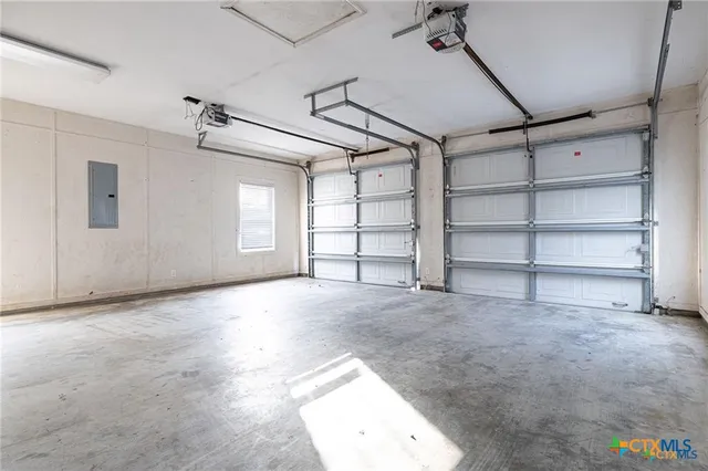 a view of a room with cabinet and mirrors
