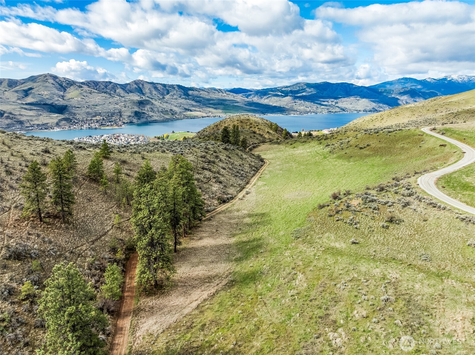 0 Skyfall Lane, Unit E Chelan, WA 98816 - Photo 11 of 22 a view of a lake with a mountain