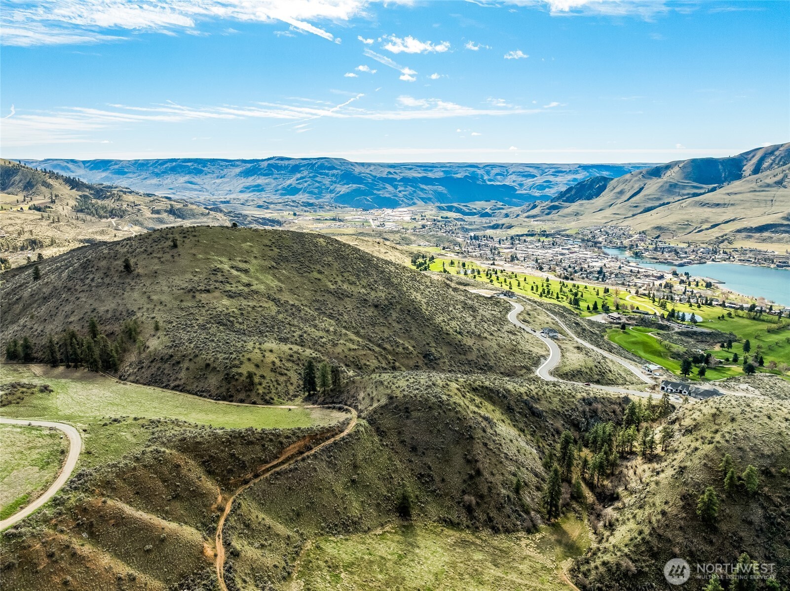 0 Skyfall Lane, Unit E Chelan, WA 98816 - Photo 20 of 22 a view of an ocean and a mountain