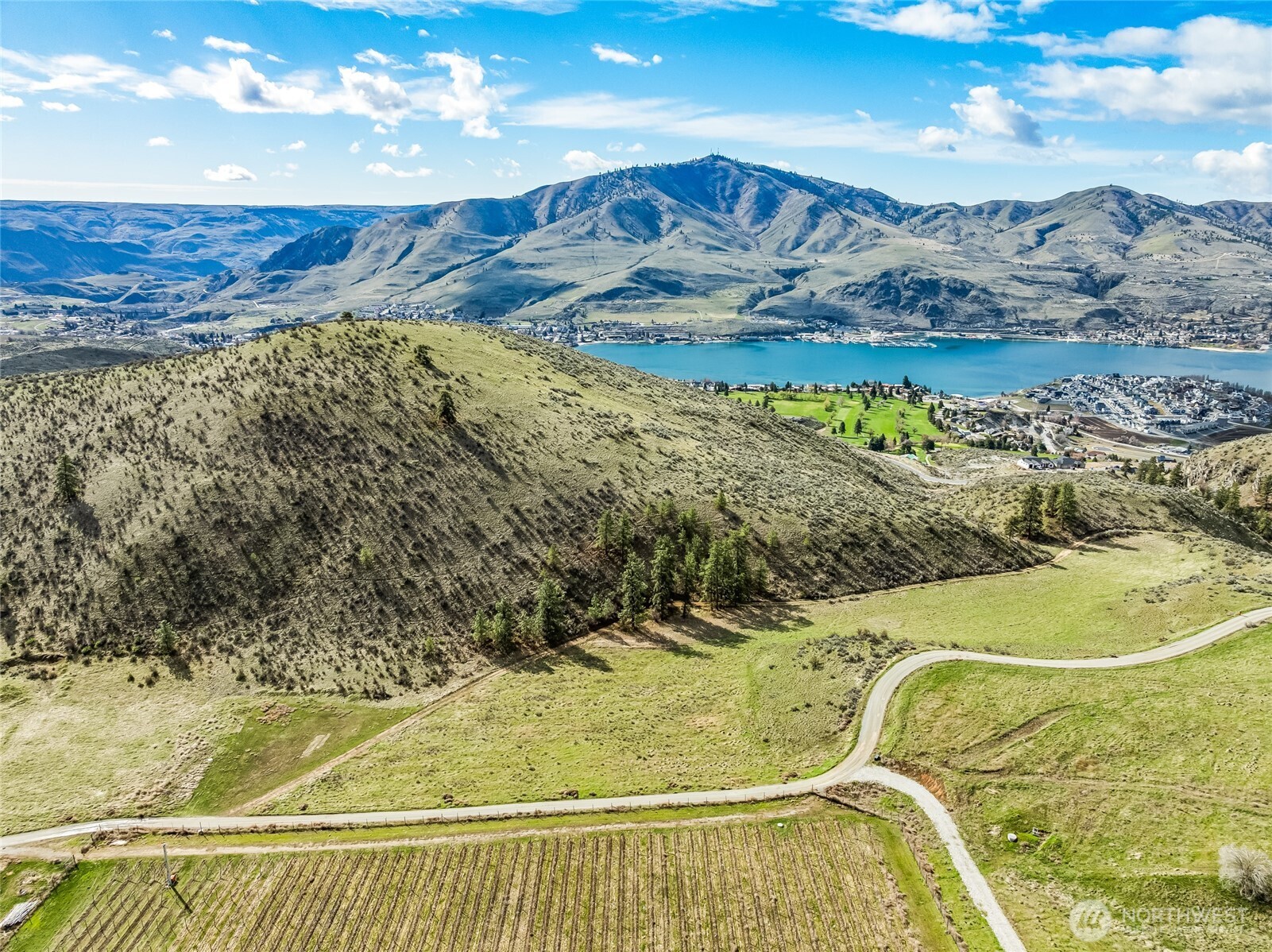 0 Skyfall Lane, Unit E Chelan, WA 98816 - Photo 2 of 22 a view of a swimming pool