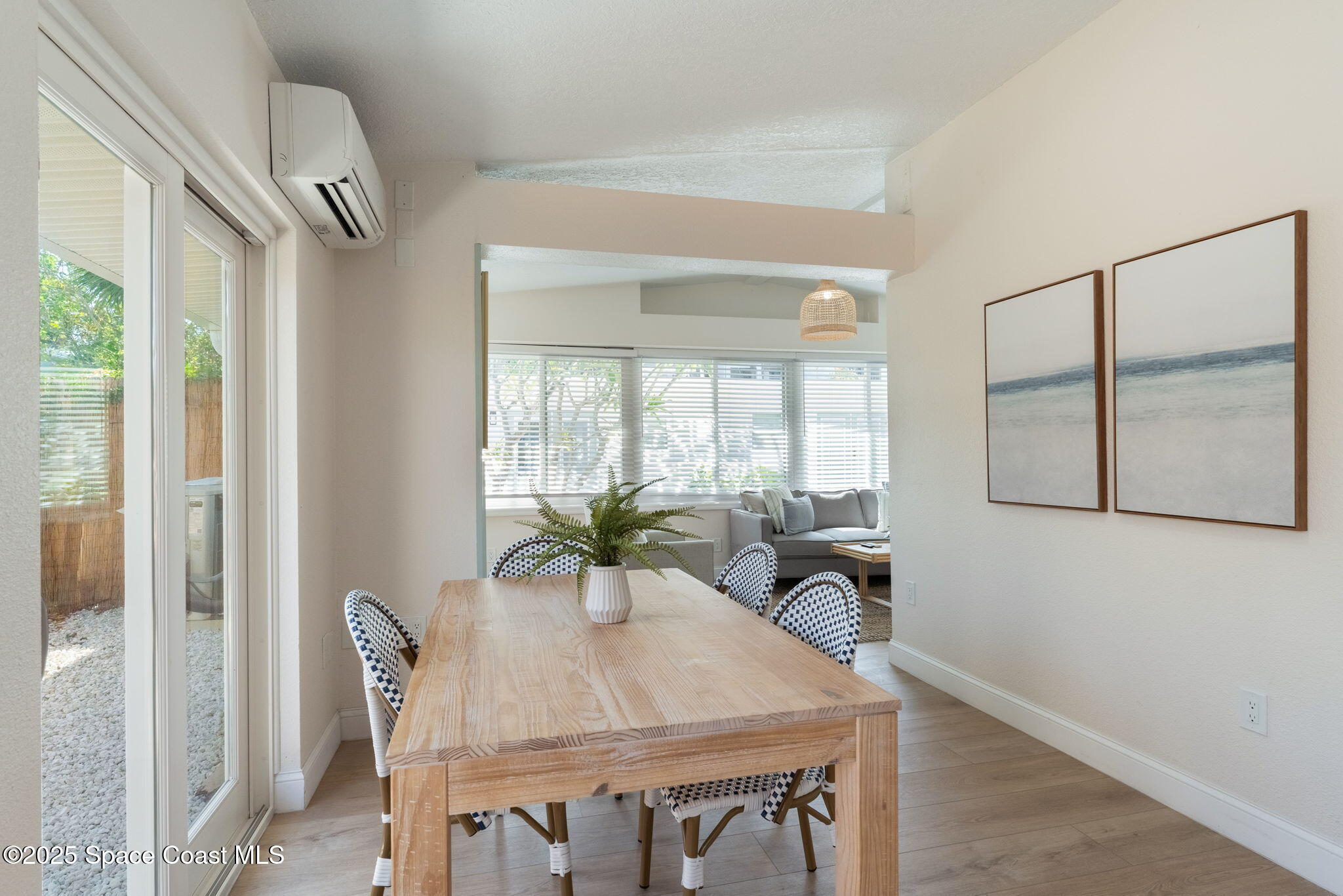 637 South Orlando Avenue Cocoa Beach, FL 32931 - Photo 20 of 83 a view of a dining room with furniture and window