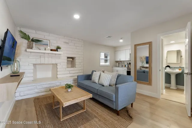a bathroom with a toilet sink and shower