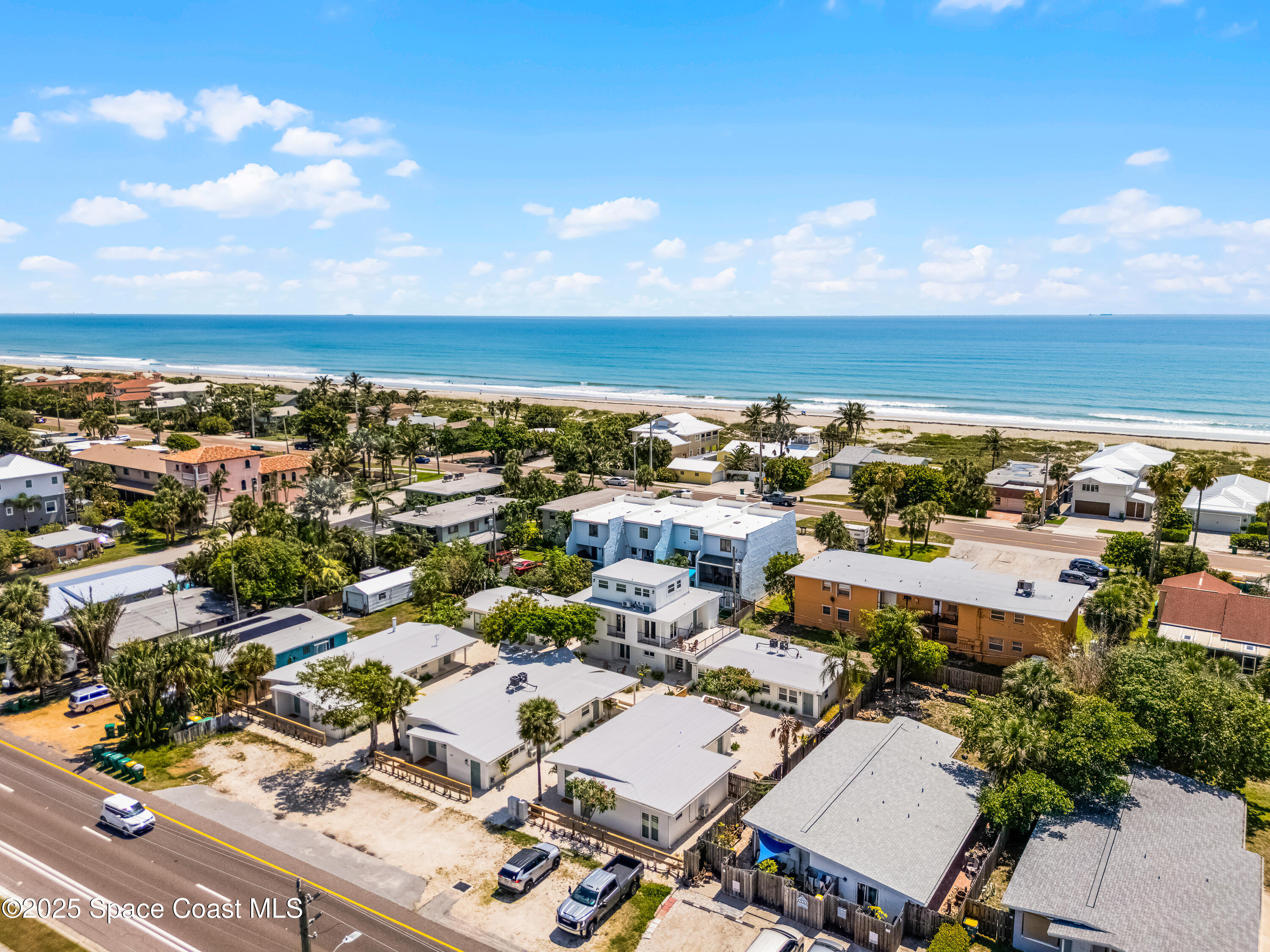 637 South Orlando Avenue Cocoa Beach, FL 32931 - Photo 4 of 83 an aerial view of a city