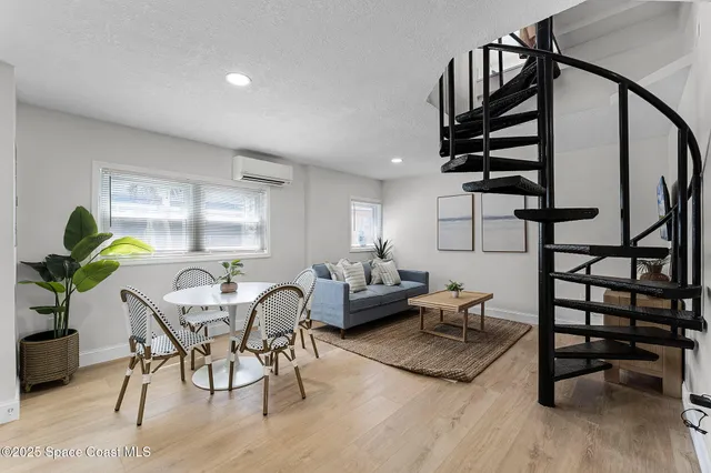 a bedroom with a bed and a lamp