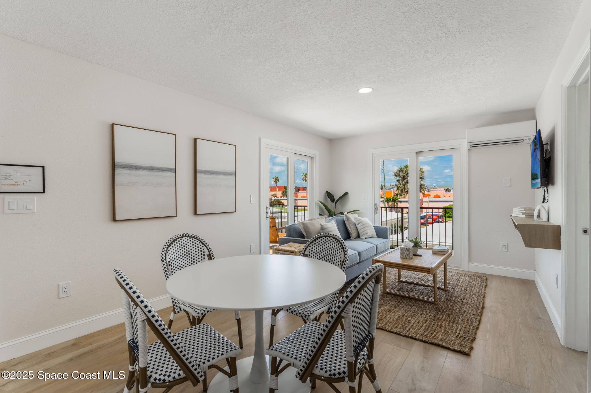 637 South Orlando Avenue Cocoa Beach, FL 32931 - Photo 59 of 83 a living room with furniture and a dining table