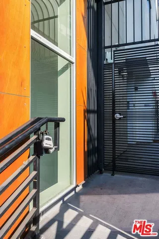 a view of a building with sitting area